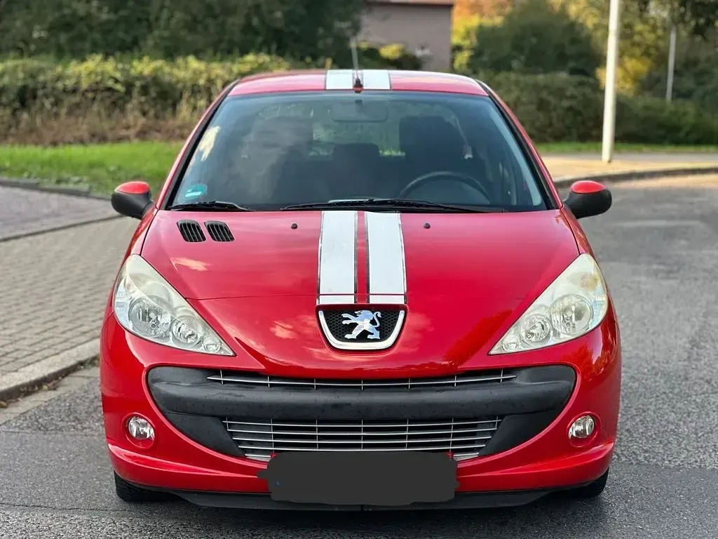 Gebraucht Peugeot 206 Sportium 73 PS (53 kW) 2012 Rot Limousine