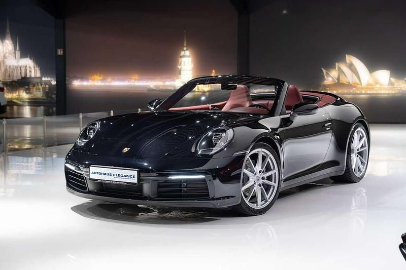 Tiefschwarz Gebraucht 2023 Porsche 911 Carrera 4 Cabriolet Cabrio | 128.980 € (Superpreis) - Bild 1/4