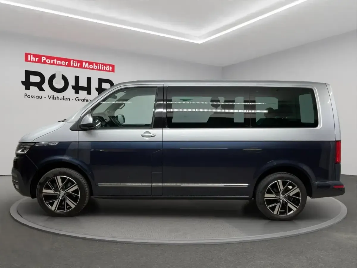 Gebraucht VW Multivan Comfortline 204 PS (150 kW) 2022 Reflexsilber metallic / starlight blue metallic Van / Kleinbus