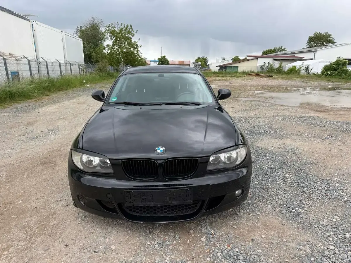 Używany BMW 116 122 KM (89 kW) 2011 Czarny Hatchback