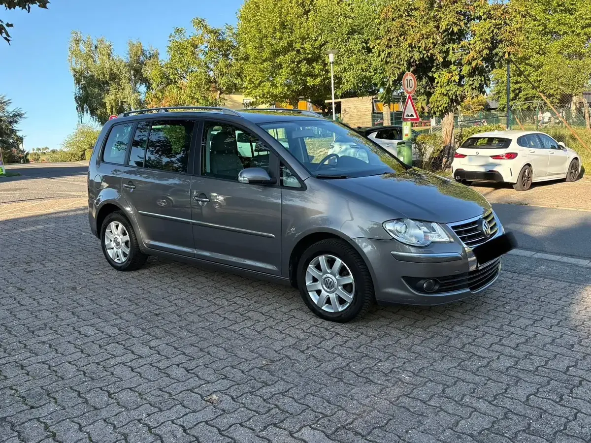 Gebraucht VW Touran 140 PS (102 kW) 2007 Braun Van / Kleinbus