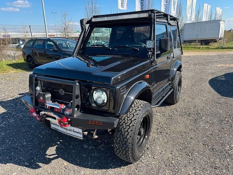 Second-hand Suzuki Samurai 69 CP (50 kW) 1997 Negru SUV