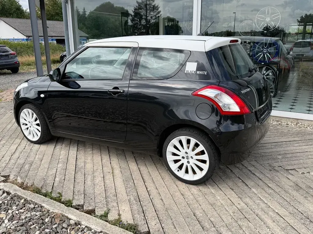 Gebraucht Suzuki Swift Basic 94 PS (69 kW) 2013 Schwarz Kleinwagen
