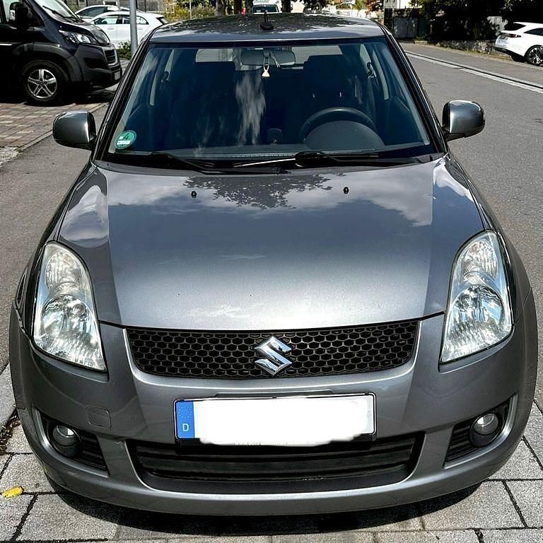 Grau Gebraucht 2008 Suzuki Swift Comfort Limousine | 2.000 € (Fairer Preis) - Bild 1/4