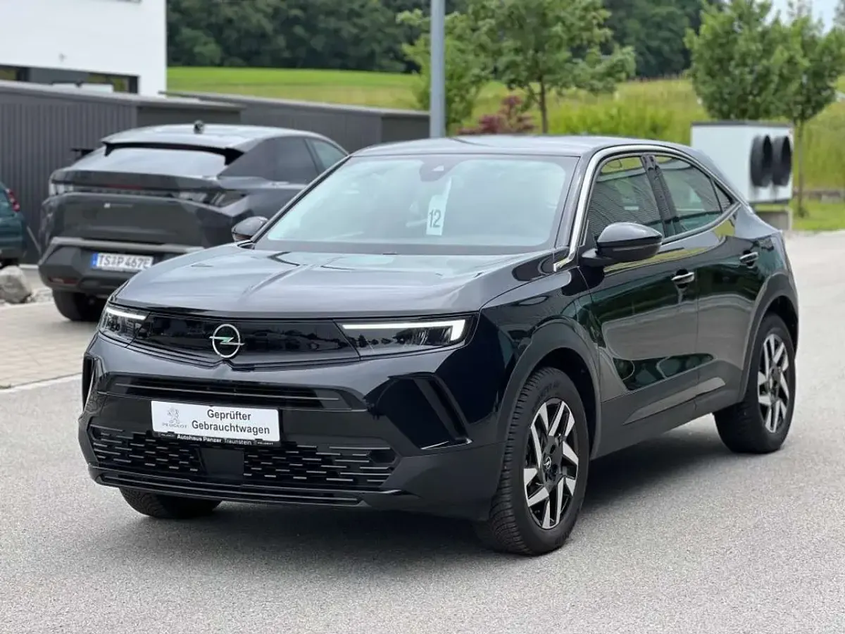 Gebraucht Opel Mokka-e Elegance 100 kW (136 PS) 2024 Karbon schwarz metallic SUV