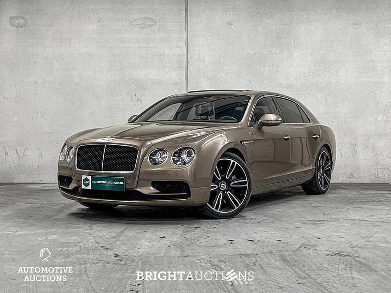 Braun Gebraucht 2018 Bentley Flying Spur Limousine | 102.850 € - Bild 1/4