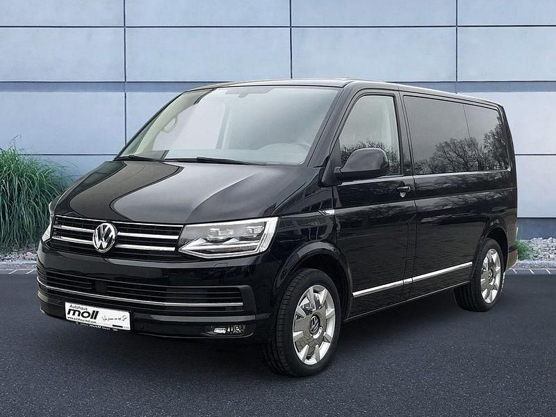 Deep black perleffekt Gebraucht 2019 VW Multivan Comfortline Van | 37.850 € (Fairer Preis) - Bild 1/4