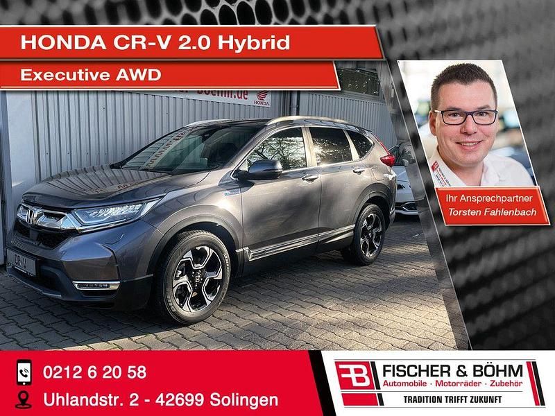 Grau Gebraucht 2021 Honda CR-V Executive SUV | 31.450 € (Etwas zu teuer) - Bild 1/4