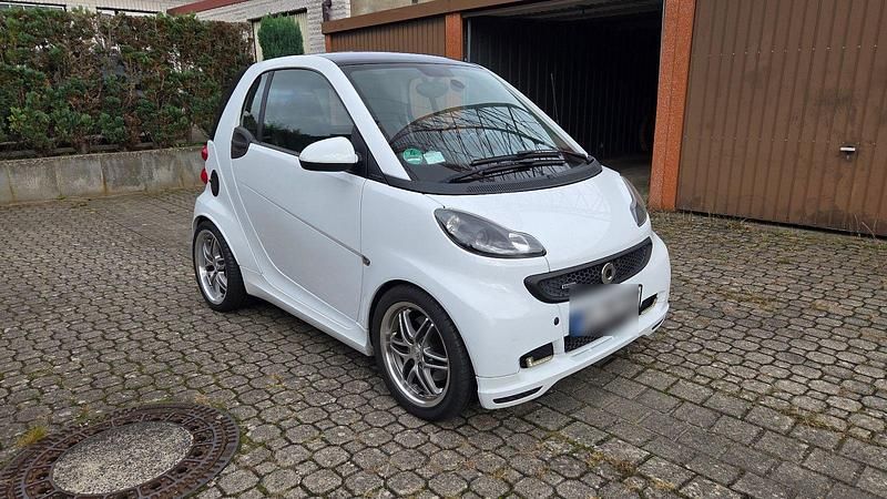 Weiß Gebraucht 2012 Smart ForTwo Coupé Brabus Xclusive Kleinwagen | 10.800 € - Bild 1/4