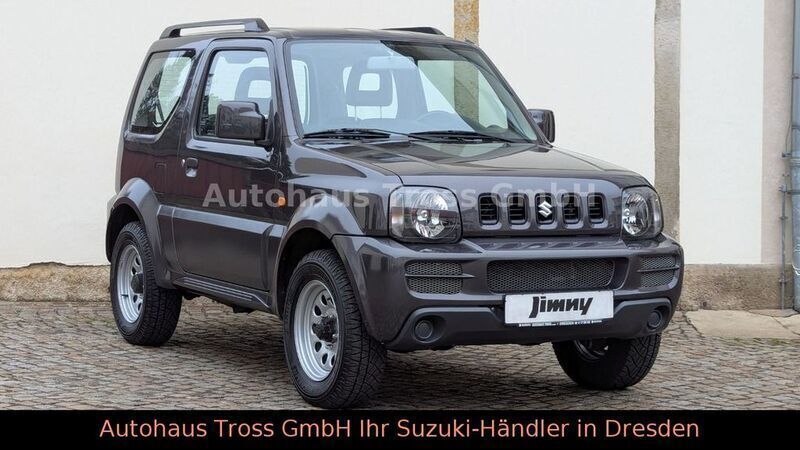 Grau Gebraucht 2009 Suzuki Jimny Comfort SUV | 13.990 € (Teuer) - Bild 1/4