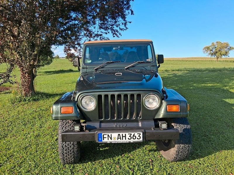 Grün Gebraucht 1997 Jeep Wrangler Sahara SUV | 17.300 € - Bild 1/4