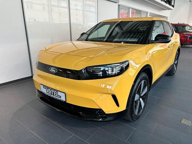 Gelb Neu 2025 Ford Capri Extended Range SUV | 38.990 € - Bild 1/4