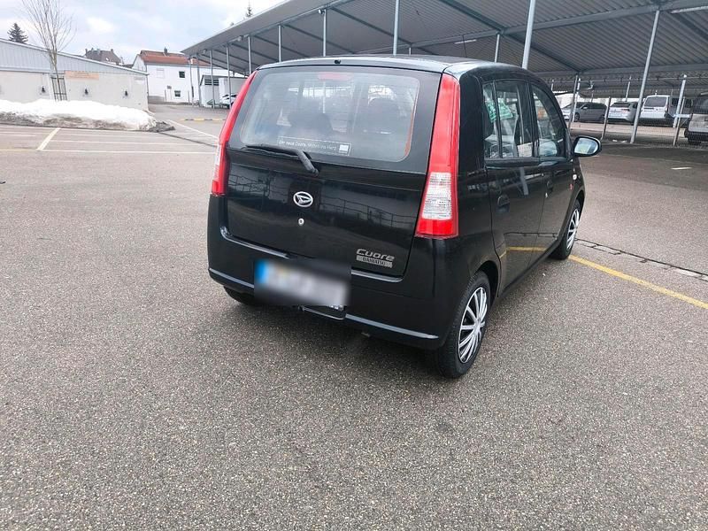 Gebraucht Daihatsu Cuore 53 PS (38 kW) 2006 Schwarz Kleinwagen