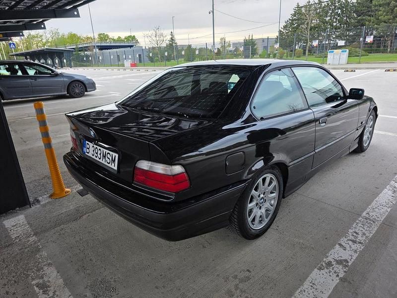 Second-hand BMW 320 150 CP (110 kW) 1994 Negru Cabrio