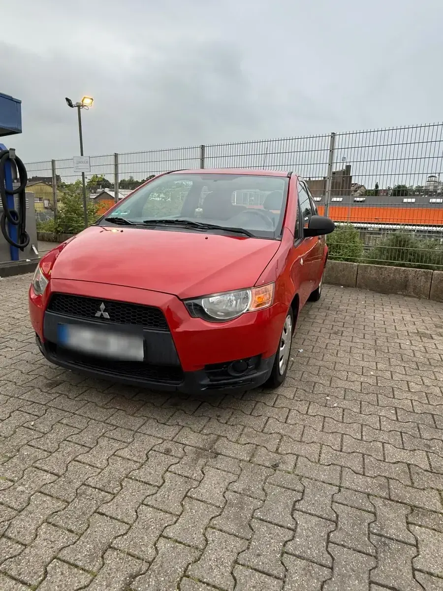 Gebraucht Mitsubishi Colt 75 PS (55 kW) 2009 Rot Kleinwagen