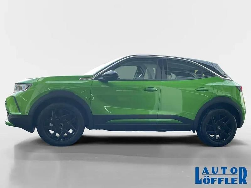 Gebraucht Opel Mokka-e Elegance 100 kW (136 PS) 2024 Matcha green (grün) SUV