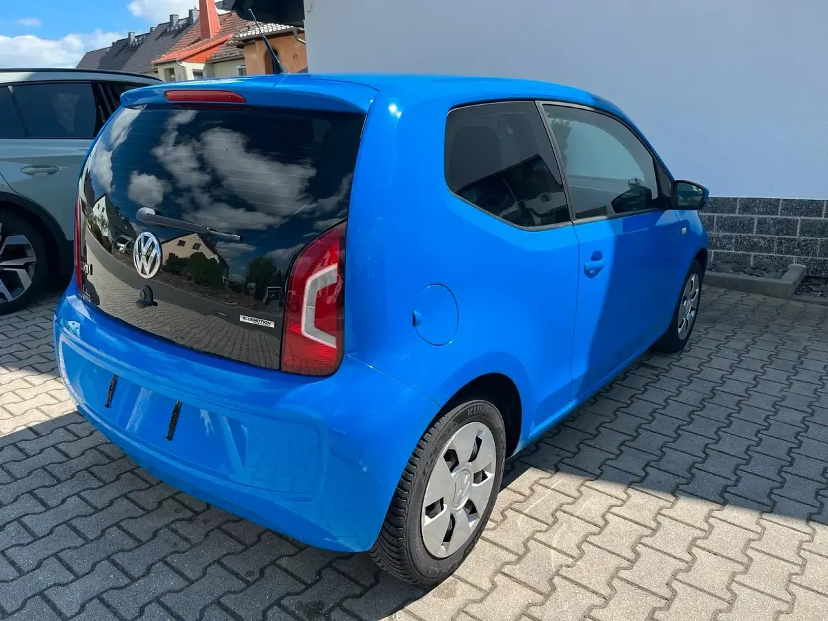 Używany VW up! 60 KM (44 kW) 2014 Niebieski Hatchback
