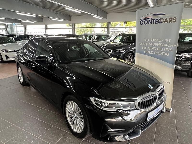 Schwarz ii Gebraucht 2020 BMW 330e Sport Line Limousine | 26.400 € (Fairer Preis) - Bild 1/4