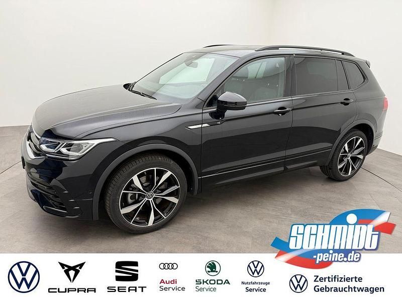 Schwarz Gebraucht 2024 VW Tiguan Allspace R-line SUV | 46.900 € (Teuer) - Bild 1/4