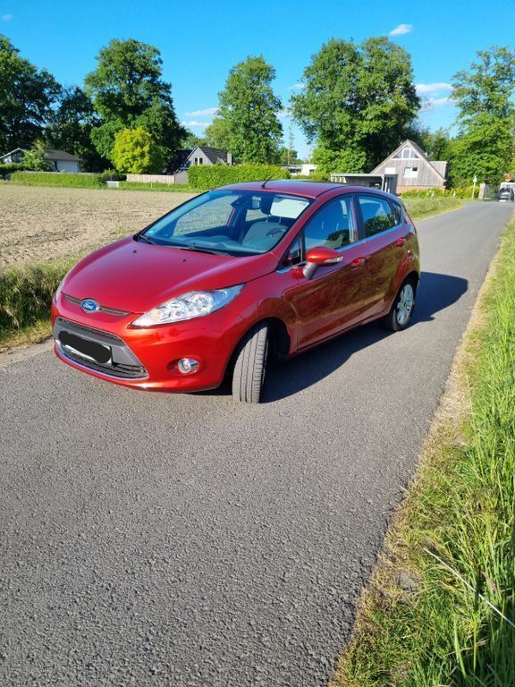 Orange Gebraucht 2009 Ford Fiesta Ghia Kleinwagen | 4.799 € (Fairer Preis) - Bild 1/4