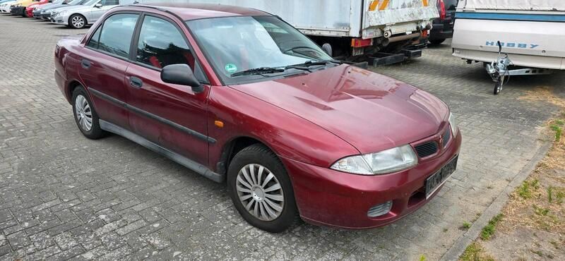 Rot Gebraucht 1999 Mitsubishi Carisma Limousine | 299 € (Superpreis) - Bild 1/4