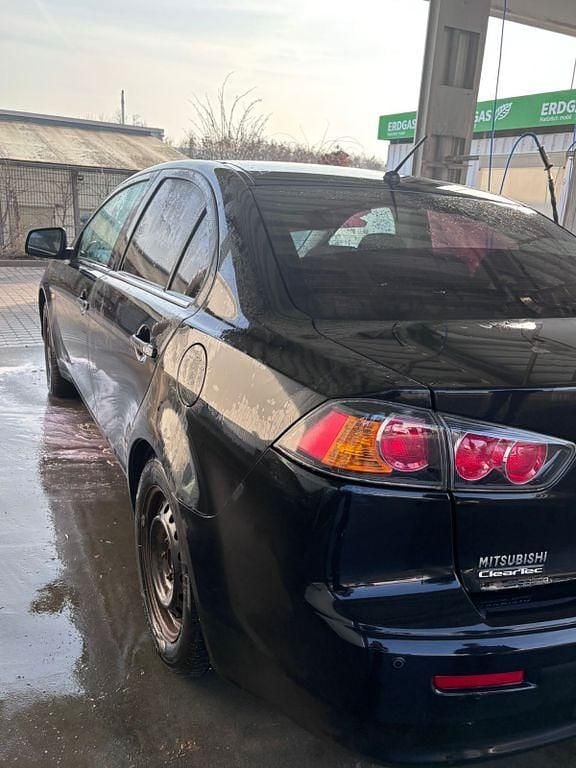 Gebraucht Mitsubishi Lancer Intense 150 PS (110 kW) 2012 Schwarz Limousine