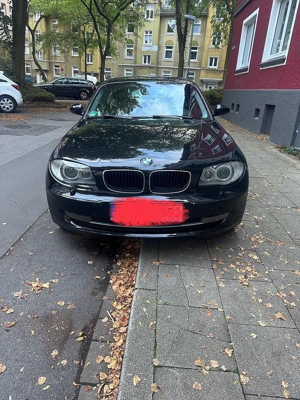 Gebraucht BMW 116 122 PS (89 kW) 2009 Schwarz Kleinwagen