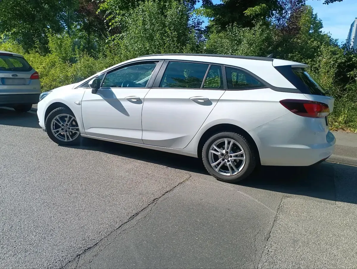 Gebraucht Opel Astra 103 PS (75 kW) 2017 Weiß Kombi