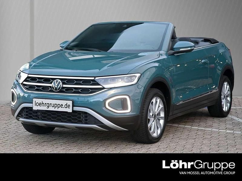 Petroleum blue metallic Gebraucht 2023 VW T-Roc Cabriolet Style Cabrio | 27.780 € (Fairer Preis) - Bild 1/4