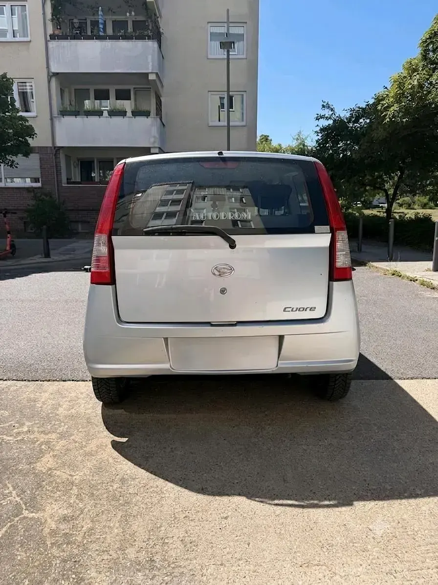 Gebraucht Daihatsu Cuore 58 PS (42 kW) 2004 Silber Kleinwagen