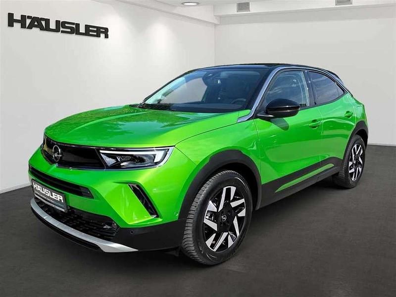 Matcha grün (metallic) Gebraucht 2022 Opel Mokka-e Elegance SUV | 18.990 € (Fairer Preis) - Bild 1/4