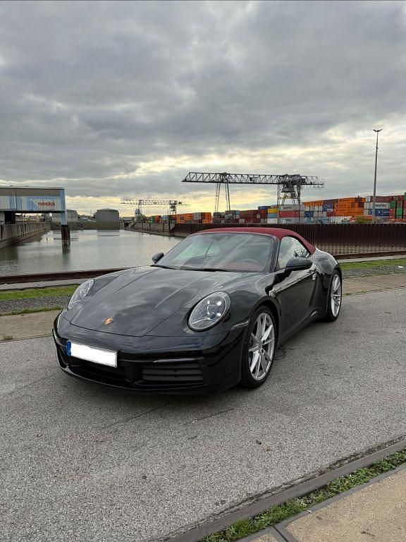 Schwarz Gebraucht 2023 Porsche 911 Carrera 4 Cabriolet Cabrio | 126.900 € - Bild 1/4