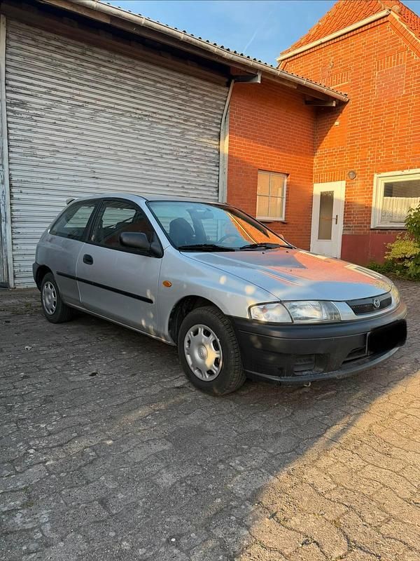 Second-hand Mazda 323F 73 CP (53 kW) 1998 Gri Hatchback