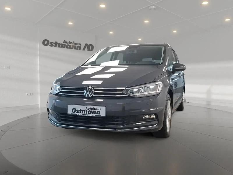 Uranograu Gebraucht 2021 VW Touran Highline Van / Kleinbus | 25.409 € (Guter Preis) - Bild 1/4