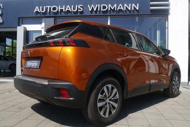 Gebraucht Peugeot e-2008 Active 100 kW (136 PS) 2022 Orange SUV