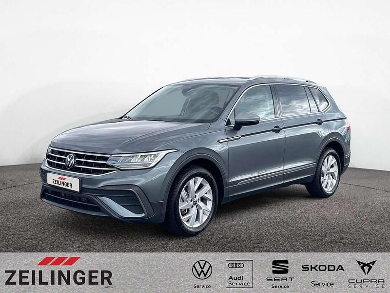 Grau Gebraucht 2024 VW Tiguan Allspace Life SUV | 34.444 € (Superpreis) - Bild 1/4