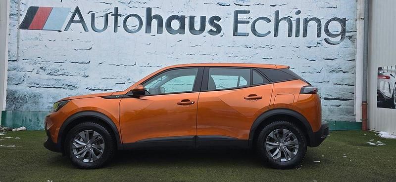 Gebraucht Peugeot e-2008 Active 100 kW (136 PS) 2021 Orange SUV