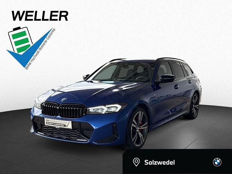 Portimao blau (blau) Gebraucht 2024 BMW 330e M Sport Kombi | 42.450 € (Superpreis) - Bild 1/4