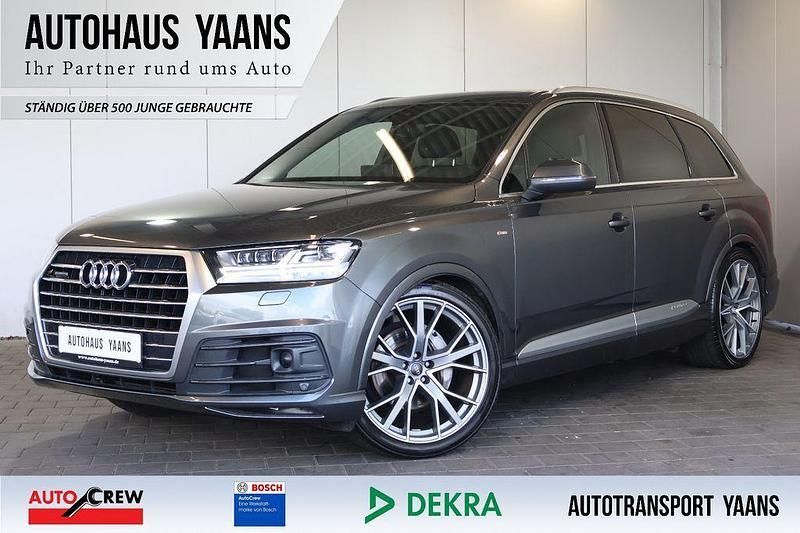 Grau Gebraucht 2020 Audi Q7 S-Line SUV | 48.789 € - Bild 1/4