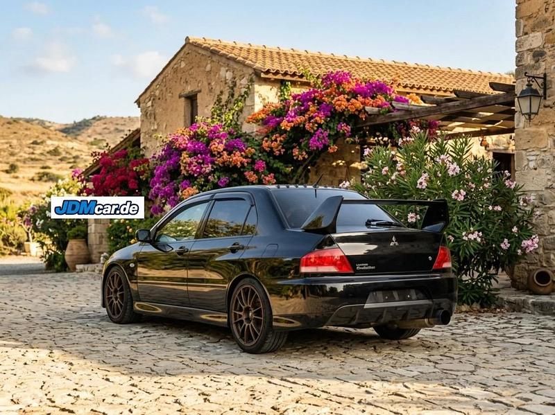 Second-hand Mitsubishi Lancer Evolution 320 CP (235 kW) 2004 Negru Berlinǎ