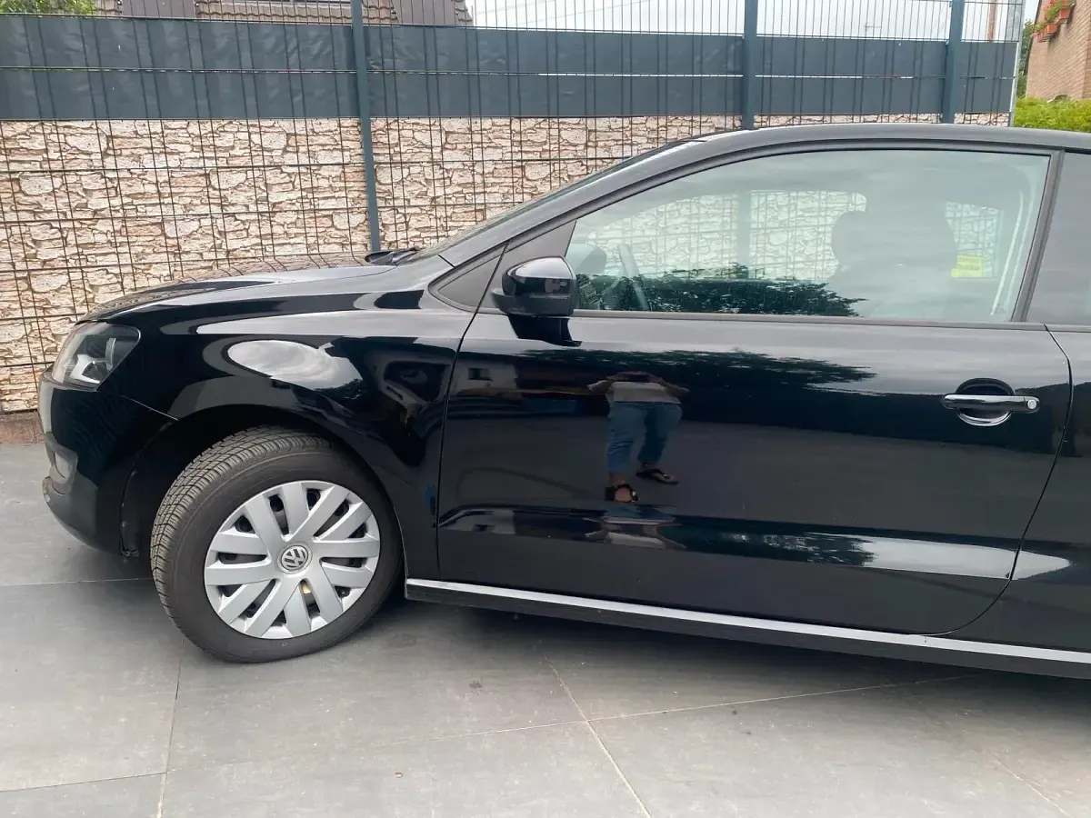 Gebraucht VW Polo Team 60 PS (44 kW) 2011 Schwarz Kleinwagen