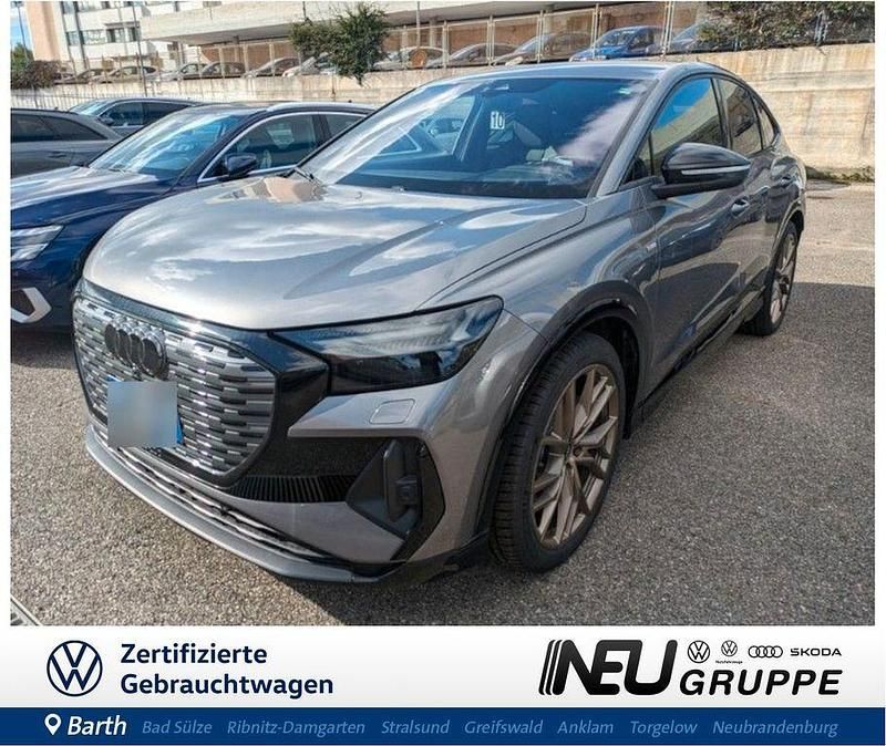 Taifungrau metallic Gebraucht 2021 Audi Q4 Sportback e-tron Sport SUV | 36.979 € (Fairer Preis) - Bild 1/4