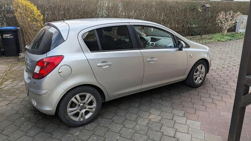 Gebraucht Opel Corsa Active 87 PS (63 kW) 2013 Silber Kleinwagen