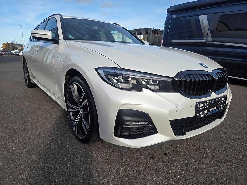 Gebraucht BMW 320e Performance 204 PS (150 kW) 2021 Weiß (metallic) Kombi