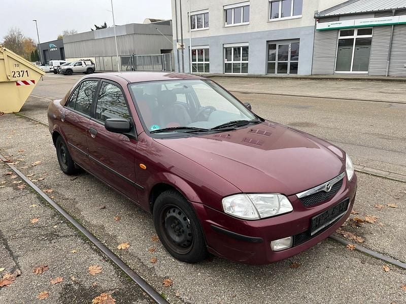 Gebraucht Mazda 323 88 PS (64 kW) 1999 Rot Limousine