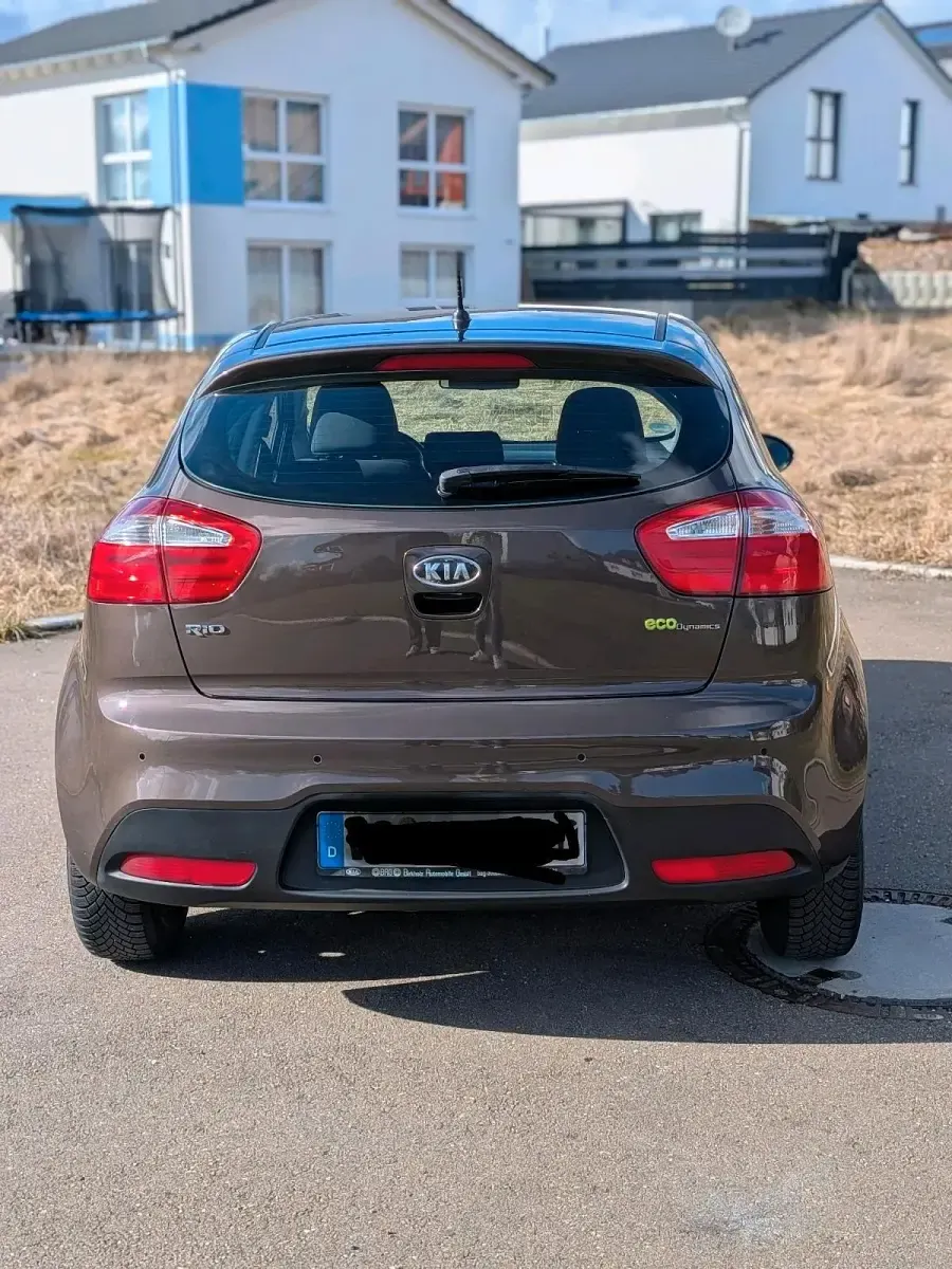 Używany Kia Rio 109 KM (80 kW) 2012 Brązowy Hatchback