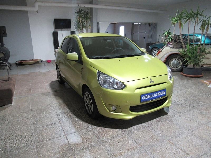 Gelb Gebraucht 2015 Mitsubishi Space Star Kleinwagen | 5.290 € (Fairer Preis) - Bild 1/4