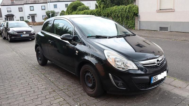Schwarz Gebraucht 2012 Opel Corsa Limousine | 3.999 € (Fairer Preis) - Bild 1/4
