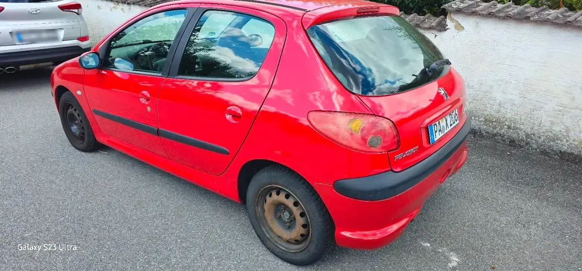 Gebraucht Peugeot 206 75 PS (55 kW) 2004 Rot Kleinwagen
