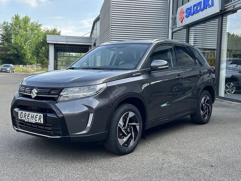 Grau Neu 2025 Suzuki Vitara Comfort+ SUV | 28.971 € (Etwas zu teuer) - Bild 1/3